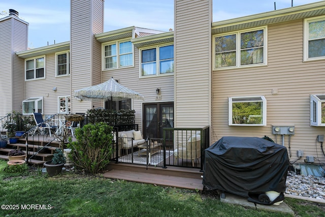31 Mulberry Ct Unit B, Brielle, NJ 08730 - rear view of property with a chimney and a deck