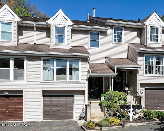 31 Mulberry Ct Unit B, Brielle, NJ 08730 - multi unit property with roof with shingles, an attached garage, and driveway