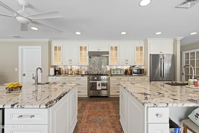 1582 Beaver Hollow Dr, Toms River, NJ 08755 - kitchen featuring stainless steel appliances, a sink, ornamental molding, a kitchen island with sink, and ceiling fan