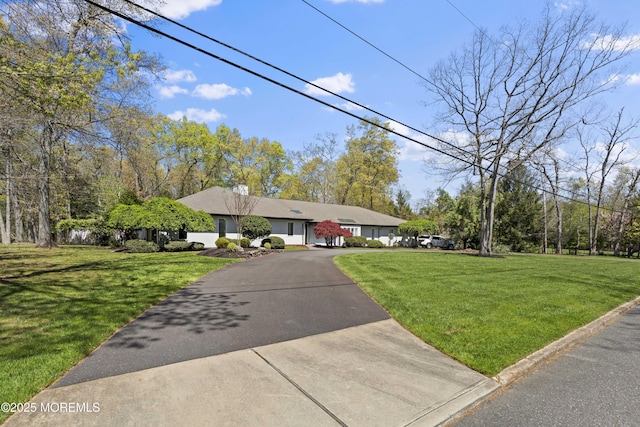 1582 Beaver Hollow Dr, Toms River, NJ 08755 - view of front of house with asphalt driveway and a front yard