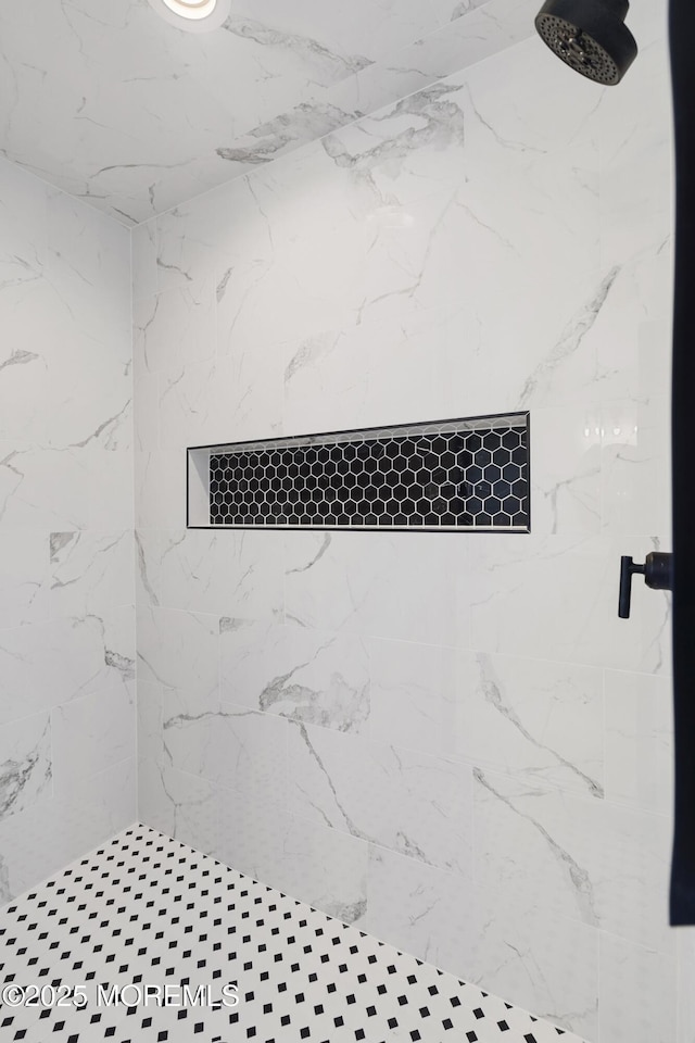 full bathroom featuring a stall shower