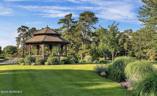 view of community with a gazebo and a lawn