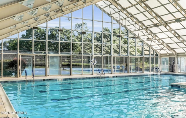 community pool featuring fence