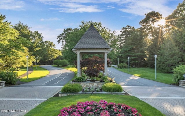 view of home's community featuring a gazebo and a yard