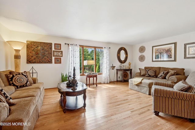 living area featuring light wood-style floors