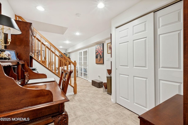 interior space featuring baseboards and recessed lighting