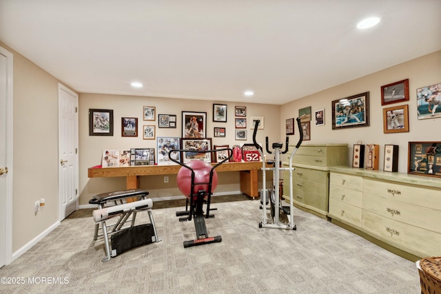 exercise room with carpet flooring and recessed lighting