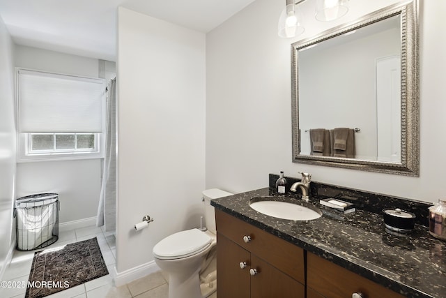 bathroom featuring vanity, tile patterned flooring, curtained shower, toilet, and baseboards