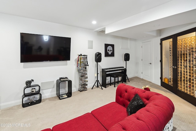 carpeted living room with baseboards and recessed lighting
