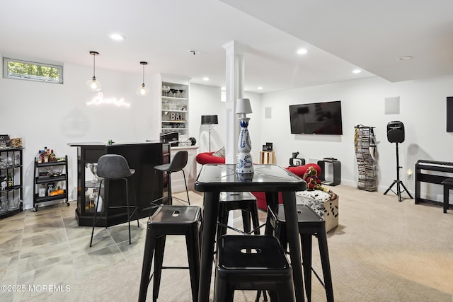 dining area featuring recessed lighting and baseboards