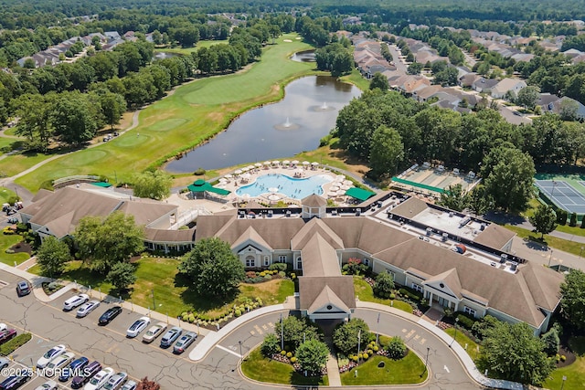 birds eye view of property featuring a water view and golf course view