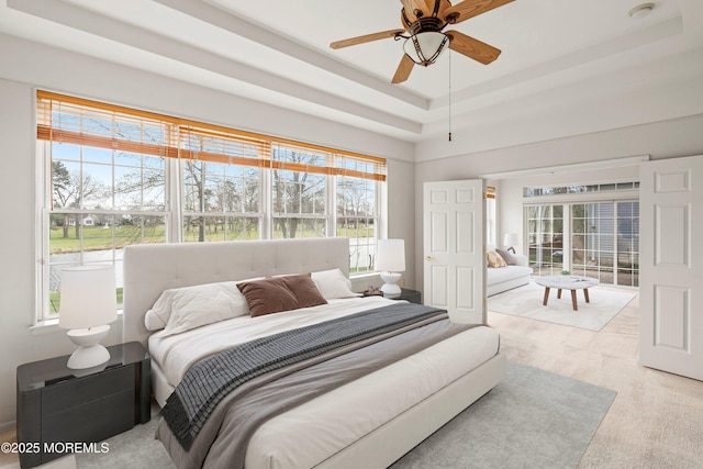 bedroom with multiple windows