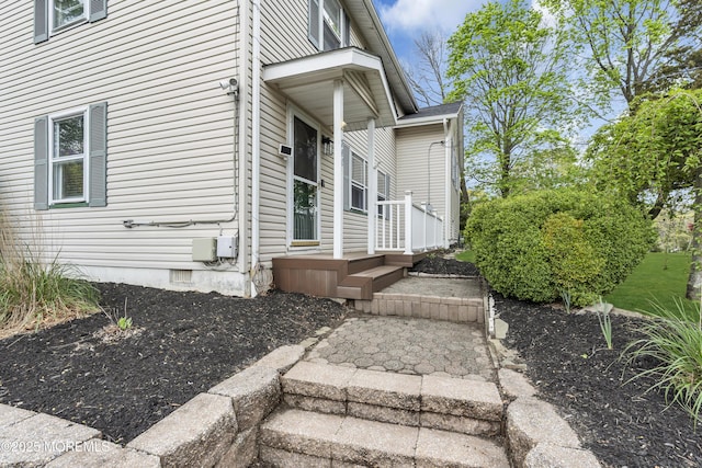 doorway to property featuring crawl space