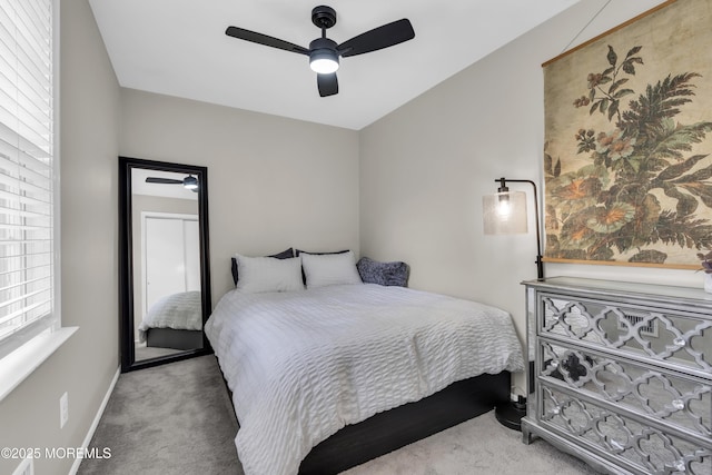 bedroom featuring carpet flooring, ceiling fan, and baseboards