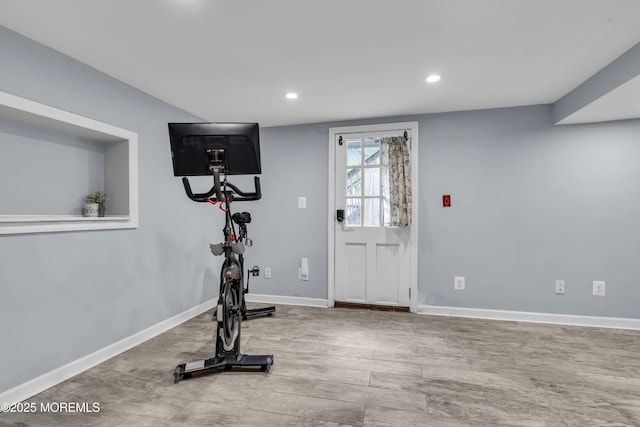 workout area with baseboards and recessed lighting