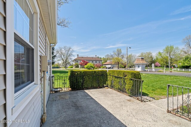 view of patio with fence