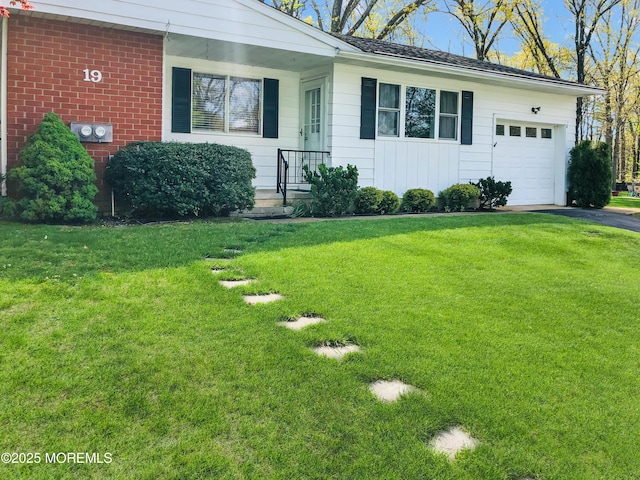 19 Florida Dr Unit A, Whiting, NJ 08759 - ranch-style house featuring an attached garage, driveway, and a front lawn