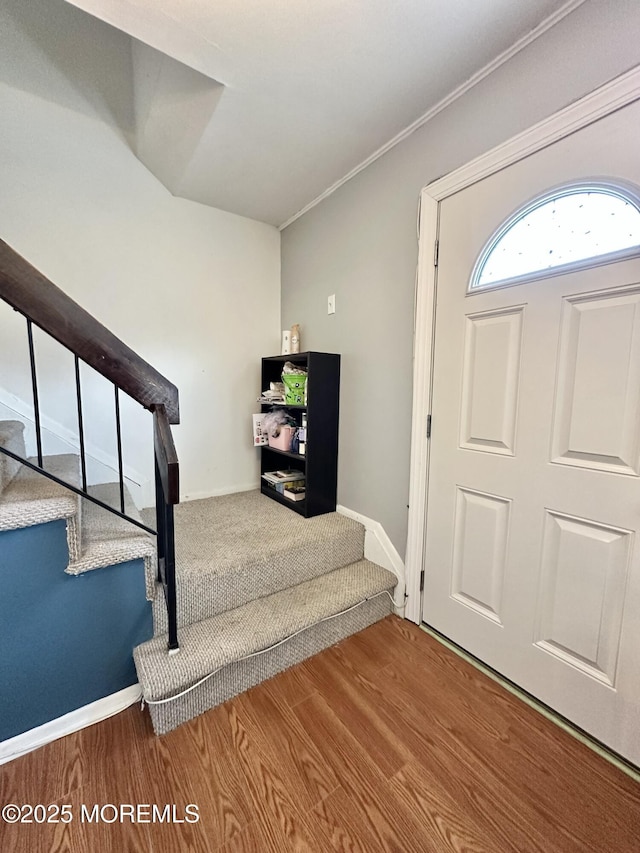 136 Windward Dr, Barnegat, NJ 08005 - entrance foyer with baseboards, crown molding, wood finished floors, and stairway