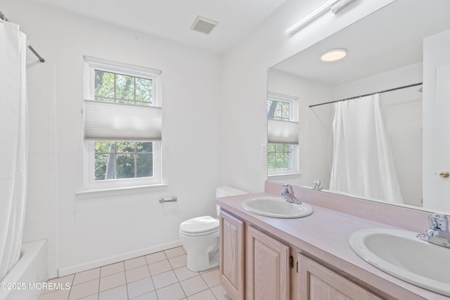 full bathroom featuring a sink, a healthy amount of sunlight, and visible vents