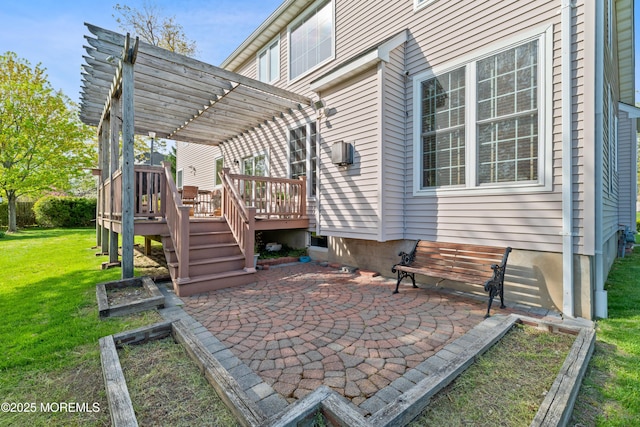 view of patio / terrace featuring a pergola and a wooden deck