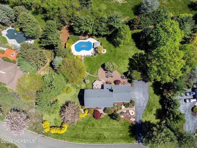 view of property location with a pool area