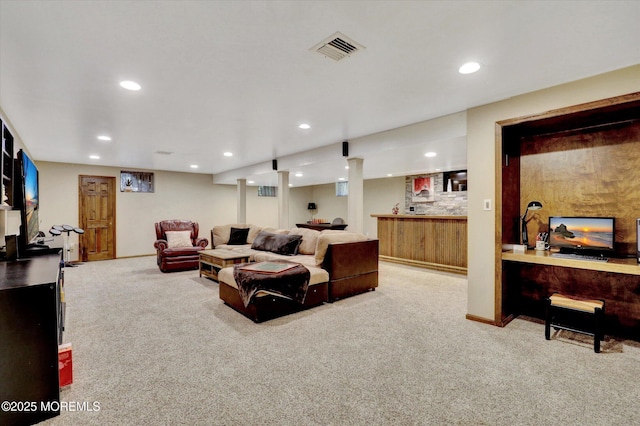 carpeted living area featuring recessed lighting