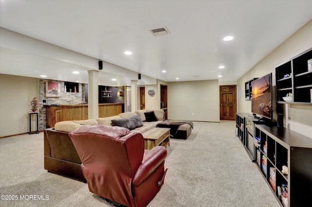 living room with bar, carpet floors, recessed lighting, and baseboards