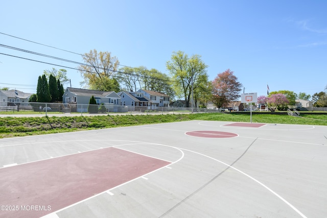 view of sport court with fence and community basketball court
