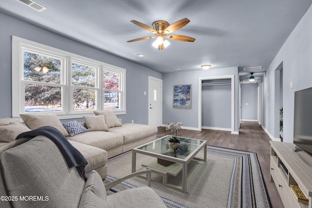 108 Manchester Ave, Forked River, NJ 08731 - living area with baseboards, a ceiling fan, wood finished floors, and visible vents