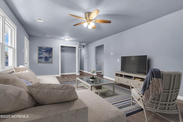 108 Manchester Ave, Forked River, NJ 08731 - living area with visible vents, a ceiling fan, baseboards, and wood finished floors