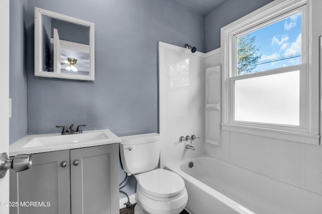 108 Manchester Ave, Forked River, NJ 08731 - bathroom with vanity, shower / bathing tub combination, ceiling fan, and toilet