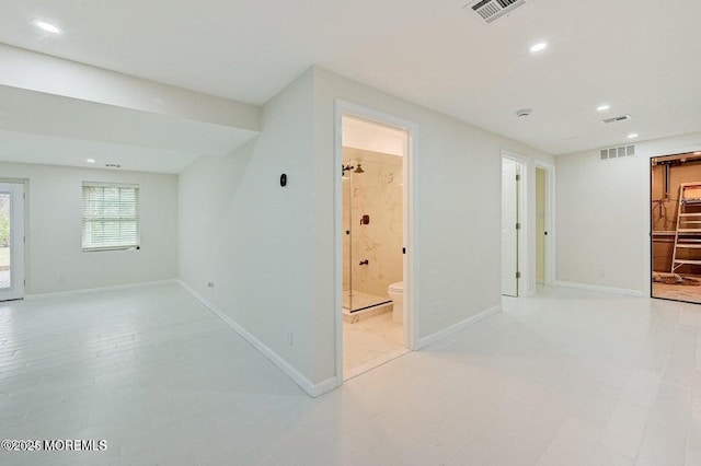 interior space featuring visible vents, recessed lighting, and baseboards