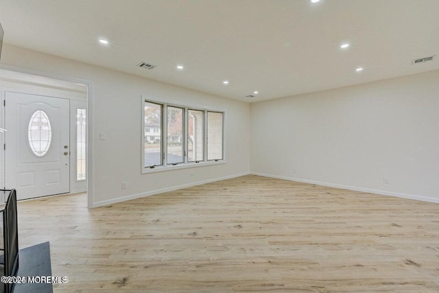 entryway featuring visible vents, recessed lighting, baseboards, and light wood-type flooring