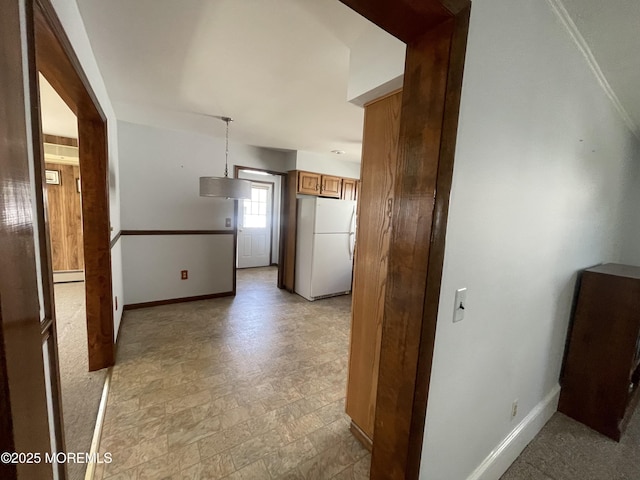 2015 5th Ave, Spring Lake, NJ 07762 - corridor with baseboards, a baseboard heating unit, and stone finish floor