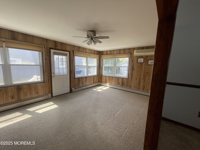 2015 5th Ave, Spring Lake, NJ 07762 - interior space featuring baseboards, wood walls, carpet, and ceiling fan