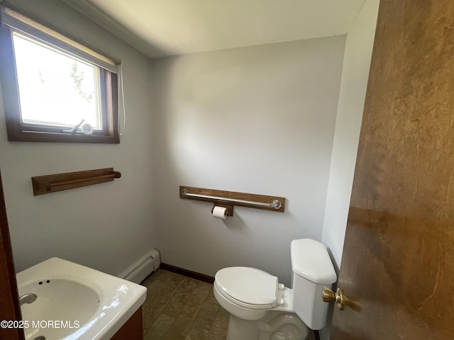 2015 5th Ave, Spring Lake, NJ 07762 - bathroom featuring toilet, baseboards, and baseboard heating