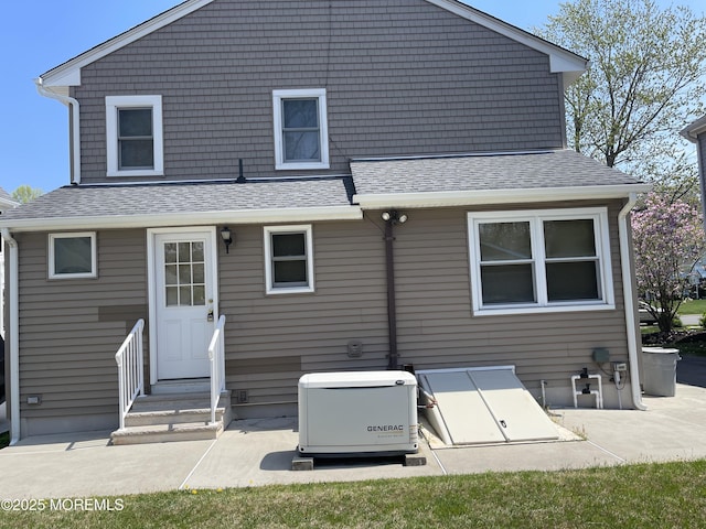 2015 5th Ave, Spring Lake, NJ 07762 - back of house featuring a shingled roof and a patio area