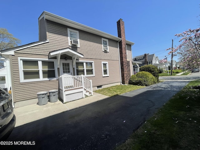 2015 5th Ave, Spring Lake, NJ 07762 - view of front of property featuring cooling unit and a chimney