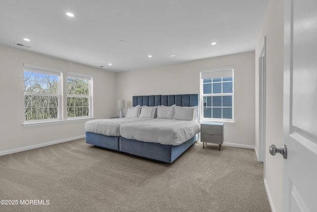 bedroom featuring baseboards, carpet, recessed lighting, and visible vents