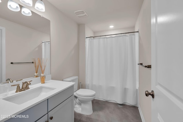bathroom featuring shower / bath combo, vanity, toilet, tile patterned floors, and visible vents
