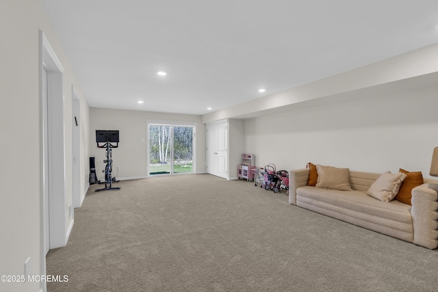rec room featuring baseboards, light carpet, and recessed lighting