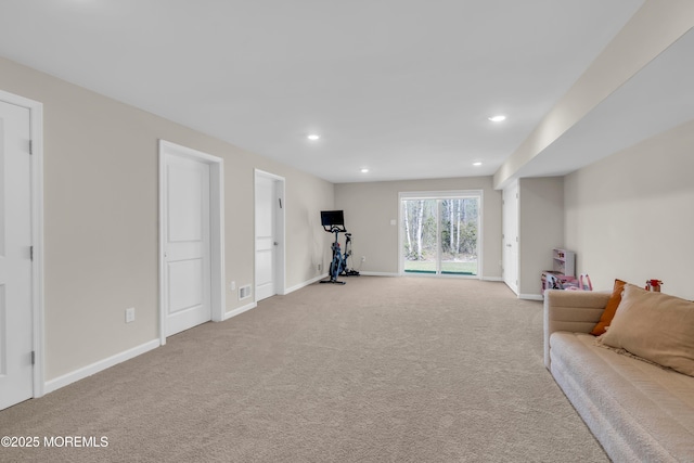 workout area featuring baseboards, carpet, and recessed lighting