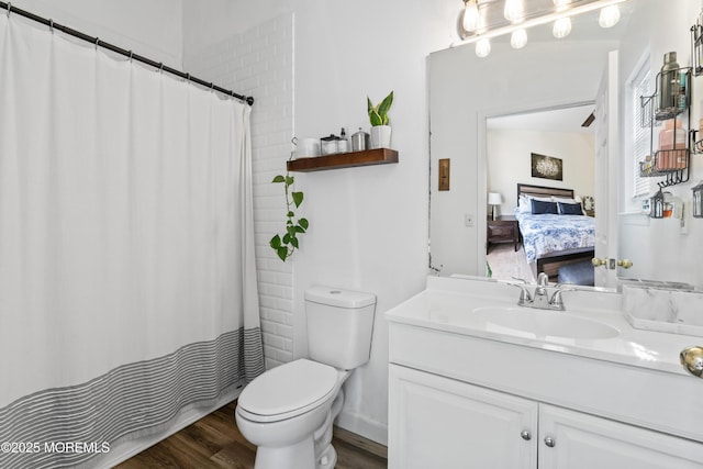 27 Mainbraid Ct, Tinton Falls, NJ 07753 - full bath featuring ensuite bathroom, wood finished floors, toilet, and vanity