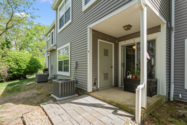 27 Mainbraid Ct, Tinton Falls, NJ 07753 - doorway to property featuring a patio area and central AC