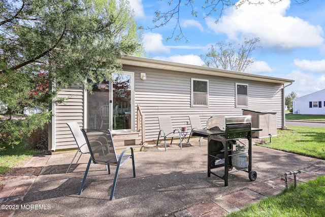 back of property featuring a patio