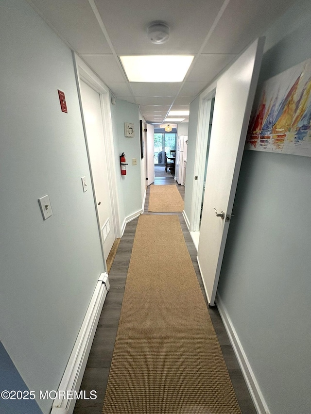 25 O St, Seaside Park, NJ 08752 - hallway featuring dark wood-style flooring and baseboards