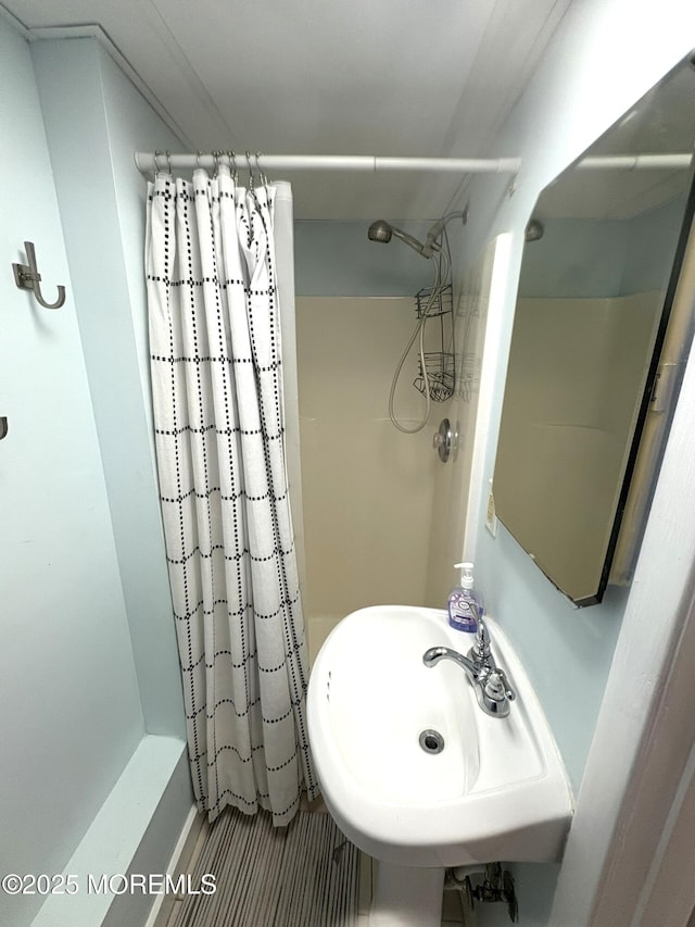 25 O St, Seaside Park, NJ 08752 - bathroom featuring a shower with shower curtain