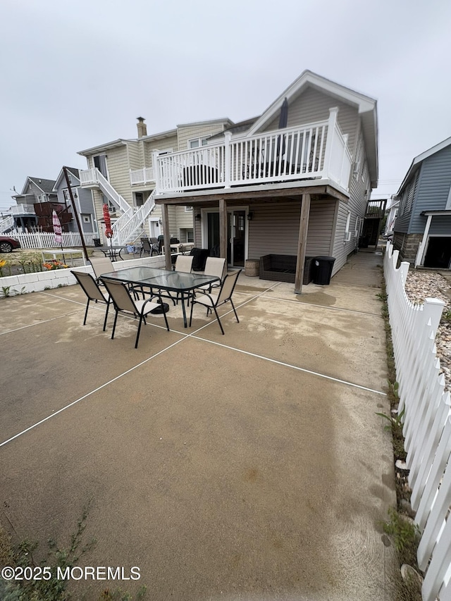 25 O St, Seaside Park, NJ 08752 - back of house featuring a patio, stairway, and a wooden deck