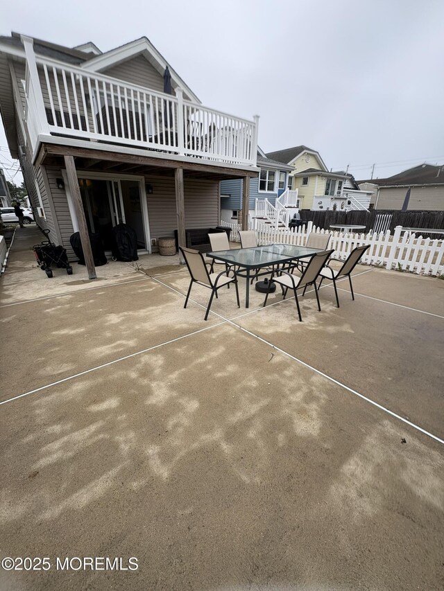 25 O St, Seaside Park, NJ 08752 - view of patio with a wooden deck and outdoor dining space
