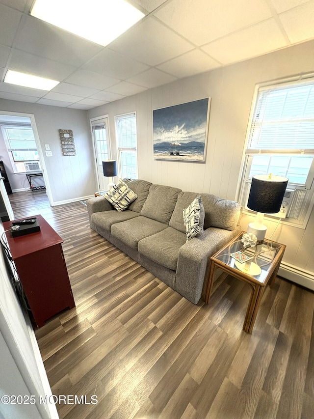 25 O St, Seaside Park, NJ 08752 - living room featuring a drop ceiling, wood finished floors, and healthy amount of natural light